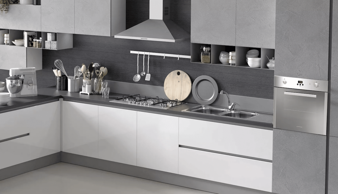 Une cuisine sobre et élégante, avec un four encastrable de la marque Airlux.